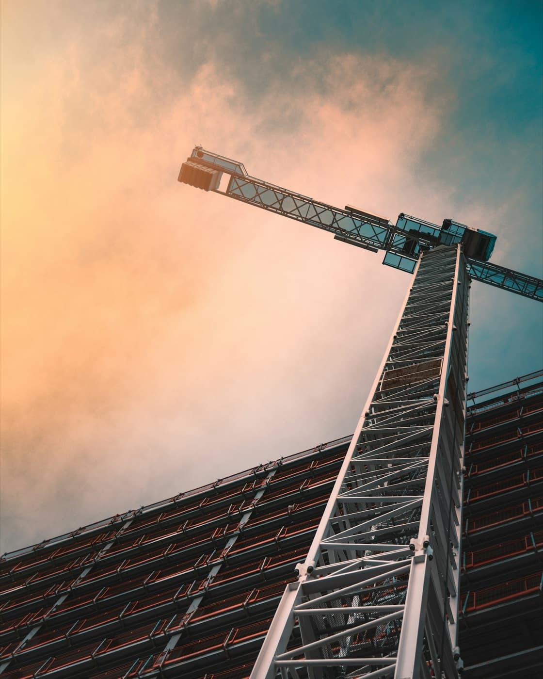 Tower crane above a building under construction